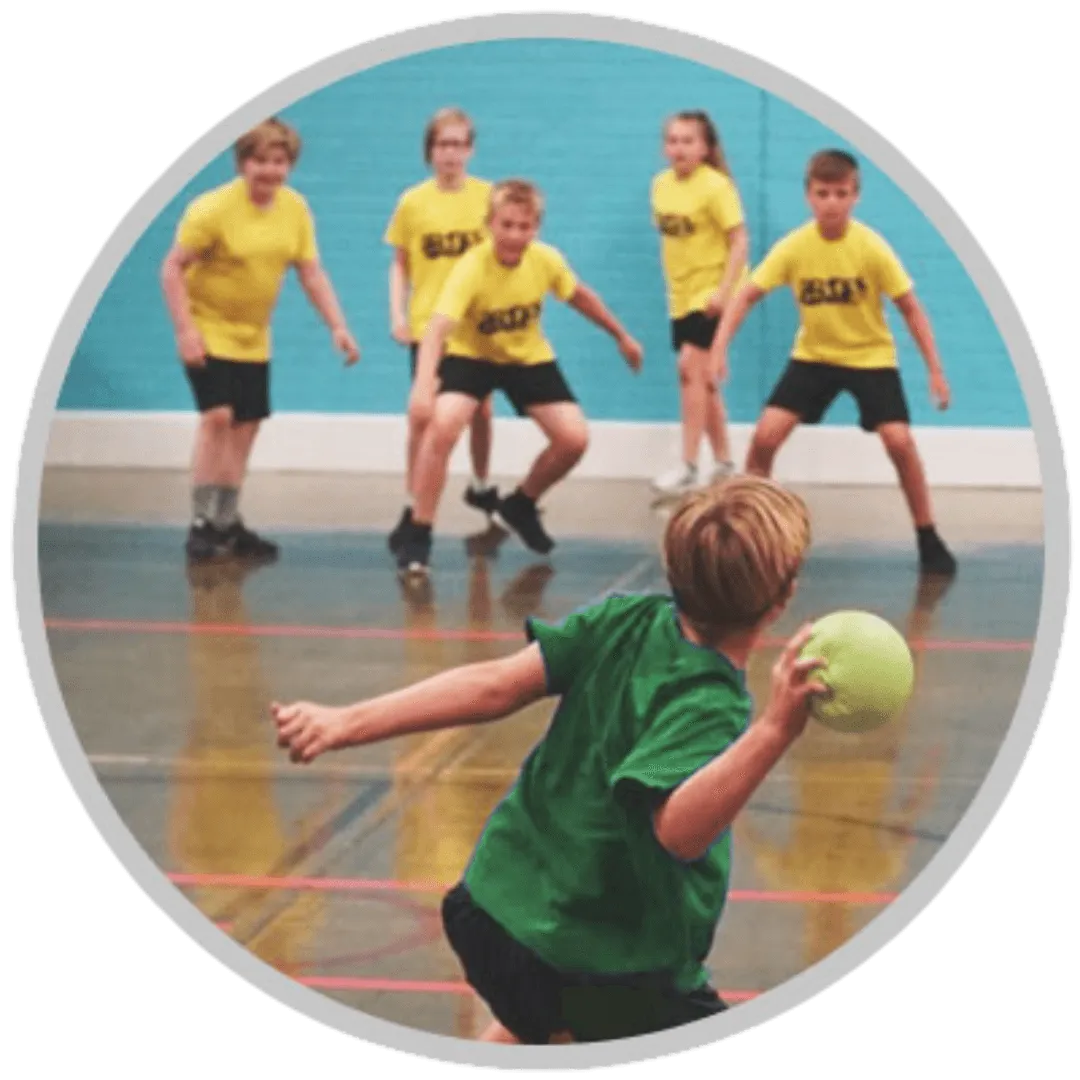 Children playing dodgeball indoors instead of going outside during high pollen.