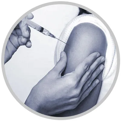 Medical professional preparing an allergy shot injection.